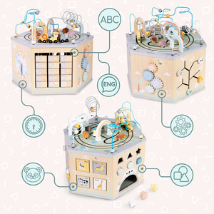 Grande cubo educacional de madeira - um brinquedo Montessori com um trem magnético e laços de motor