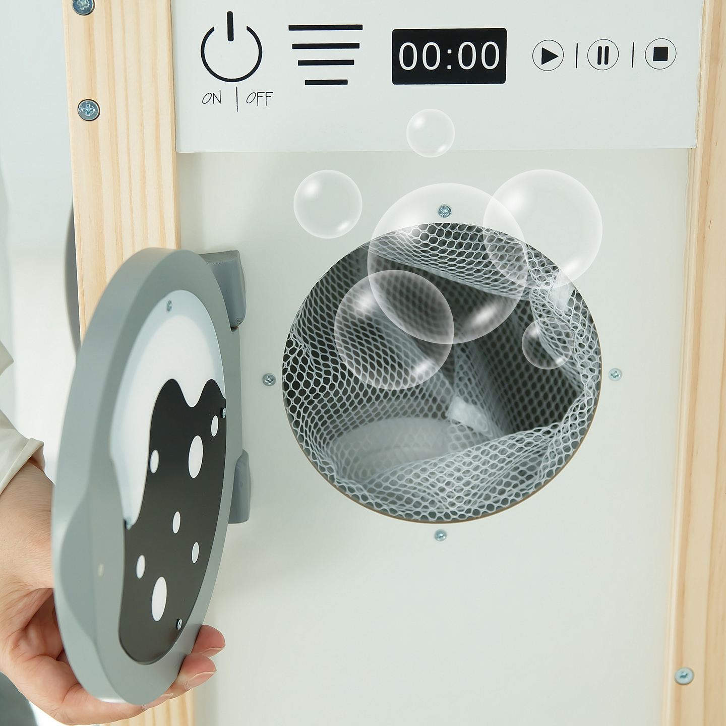 Cozinha interactiva com máquina de lavar roupa, máquina de lavar louça e quadro de giz