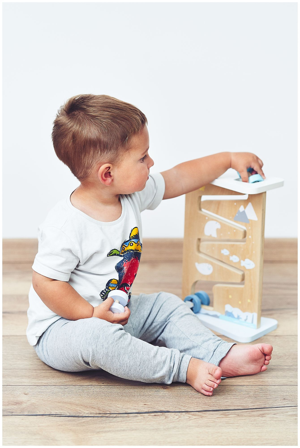 Placa de manipulação sensorial de madeira dupla face