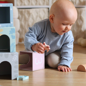 Torre - classificador com figuras de dinossauros